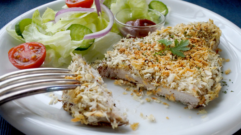 coconut-crusted Pork chop with salad