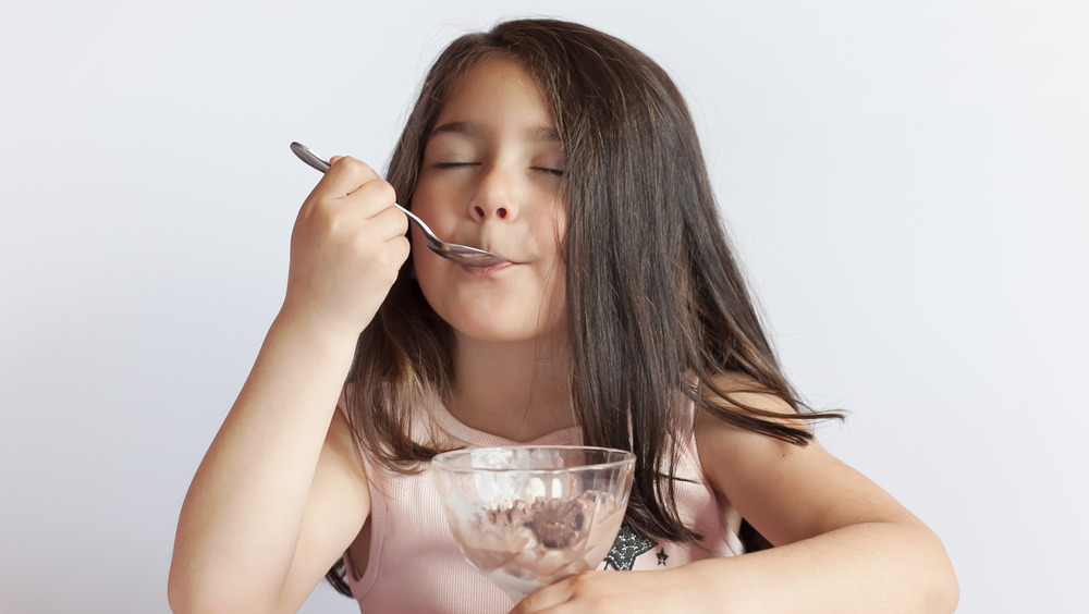 Girl savoring ice cream