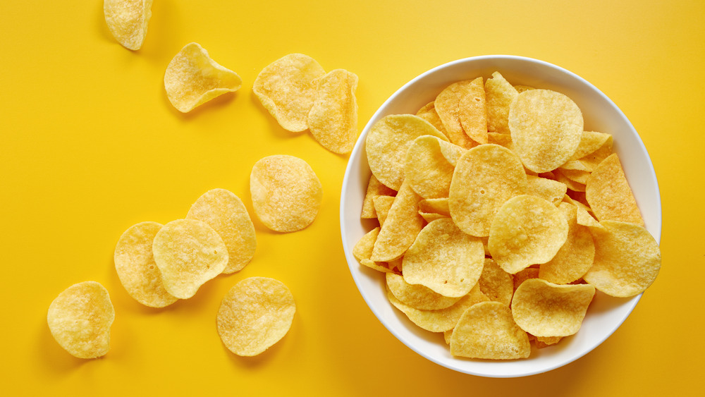 Potato chips in a white bowl