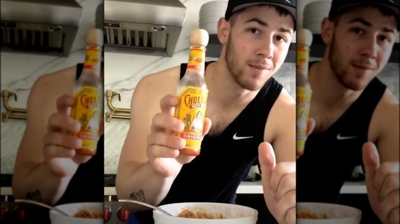 Nick Jonas prepares tuna salad in his kitchen 