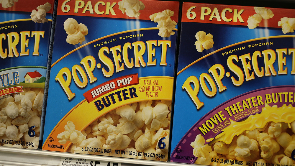 Line of Pop Secret popcorn boxes on shelf