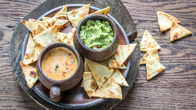 Queso, guacamole, and chips