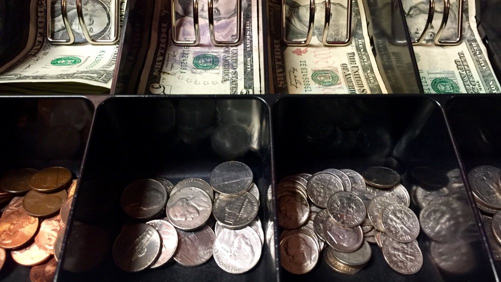 Coins in cash register