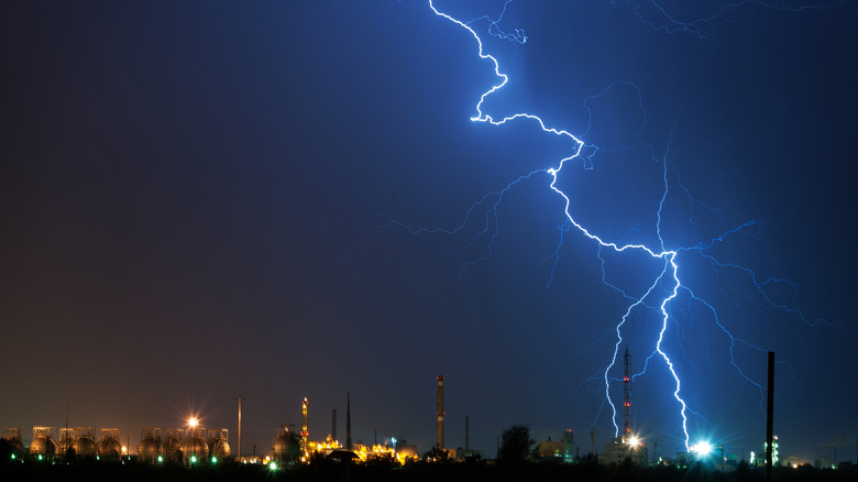 Dark night sky with crack of white lightning