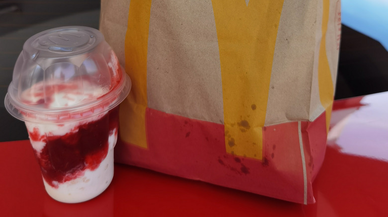 McDonald's strawberry sundae  with bag