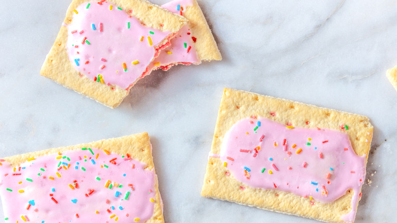 Whole and halved Pop-Tarts on countertop