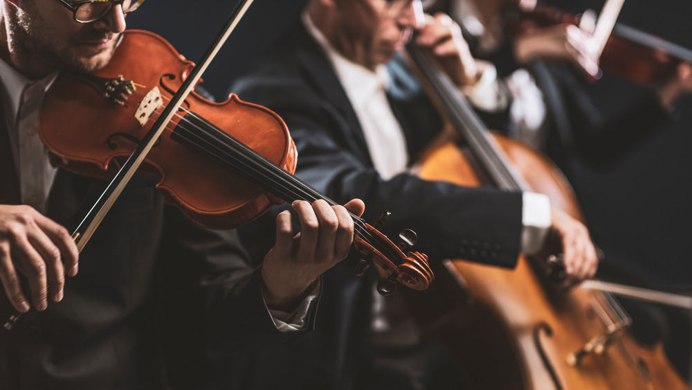 playing calming music, string instruments