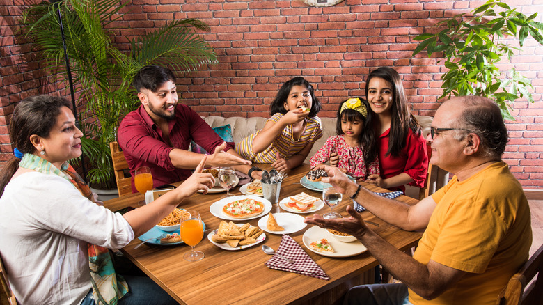 Family eating inside at a restaurant