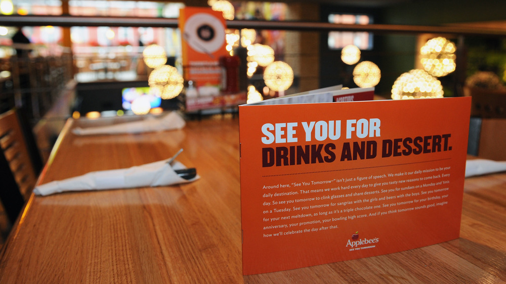 Applebee's table with menu displayed