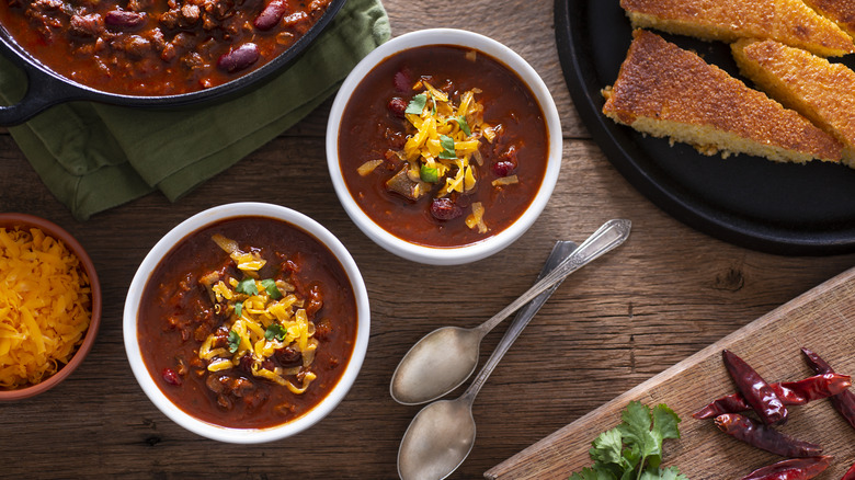 bowls of chili with cornbread