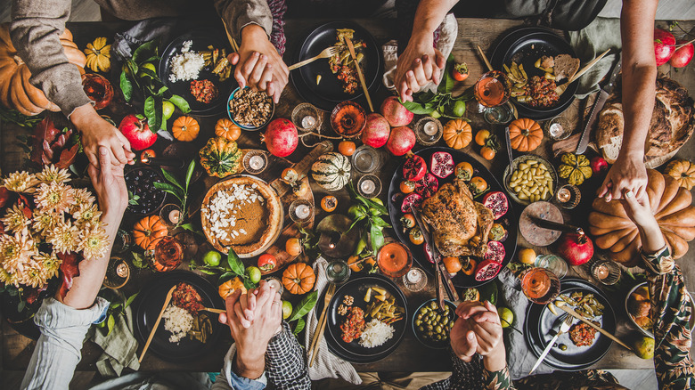 Friendsgiving table with autumn food