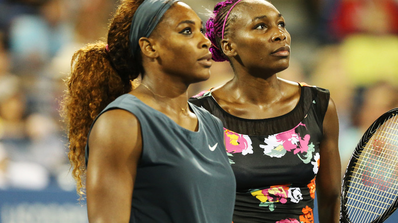 Serena and Venus Williams playing tennis