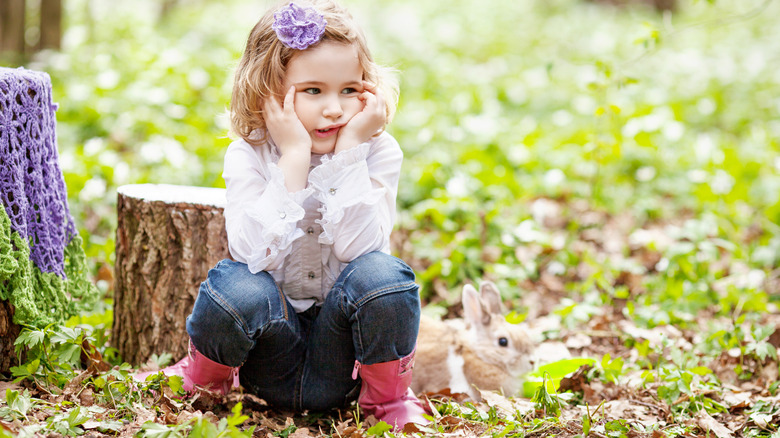 A child and a bunny