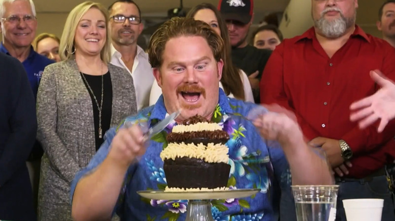 Casey eating a giant cupcake