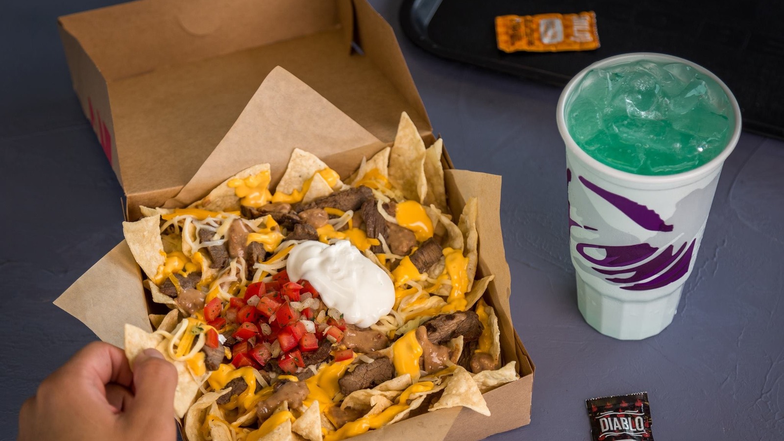 The Taco Bell Baja Blast Hack That's Oddly Coming Up Creamy