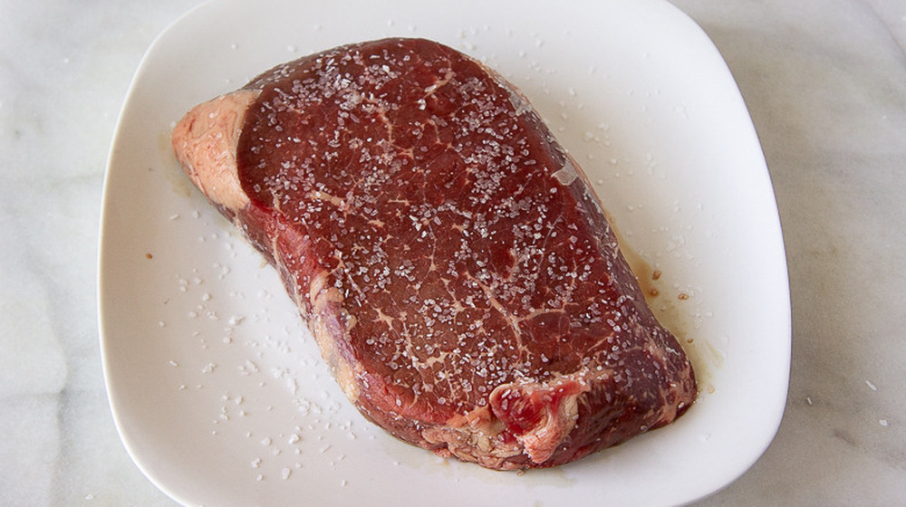 seasoned raw steak