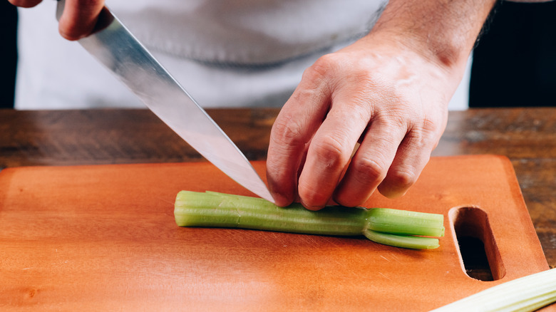 Getting ready to cut celery