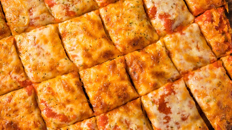 close up of tavern style cheese pizza