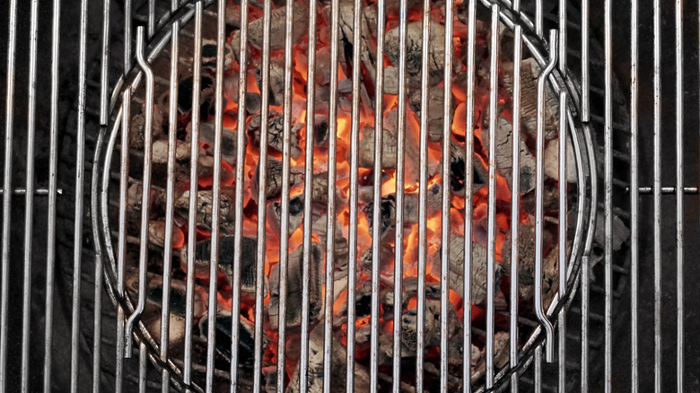 Grill with burning charcoal