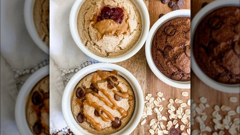 Three bowls of different baked oats variations 