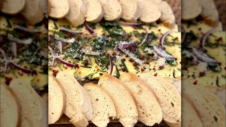 A butter board with bread 