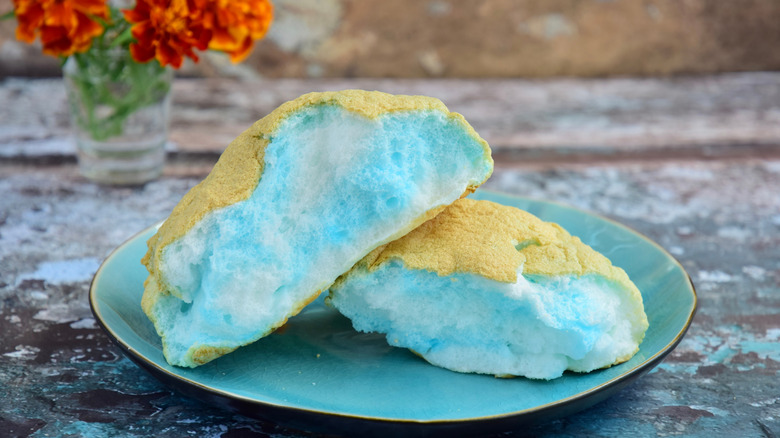 Blue and white cloud bread on a blue plate 