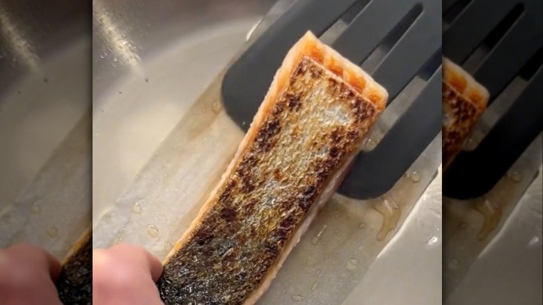 salmon with crispy skin on parchment paper