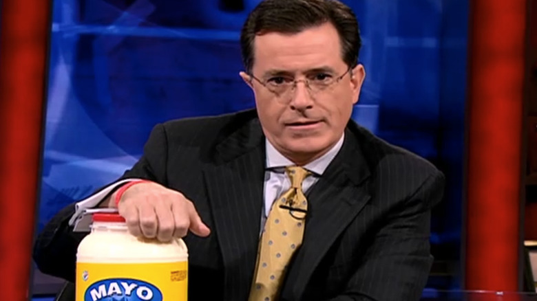 Stephen Colbert with jar of mayonnaise