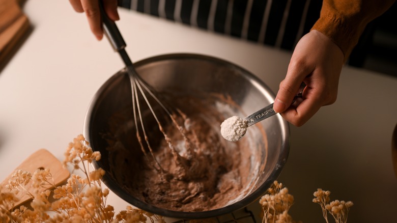 using whisk to mix cookie dough 