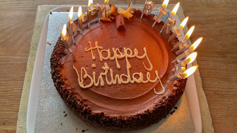 Chocolate birthday cake with candles