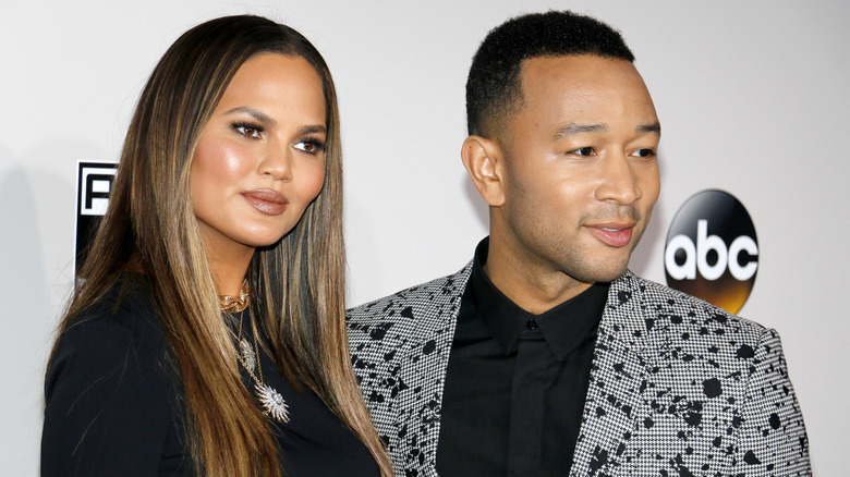 Chrissy Teigen and John Legend on red carpet