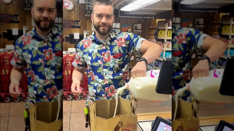 employee pours milk in bag