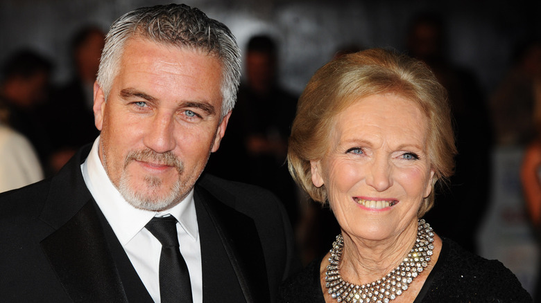 Mary Berry and Paul Hollywood smiling at event