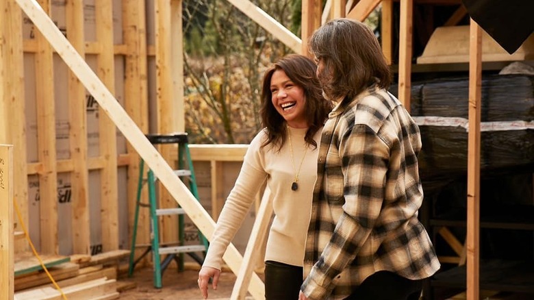 Rachael and husband John on construction site at home