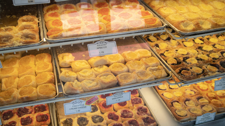 Assorted kolaches in bakery case