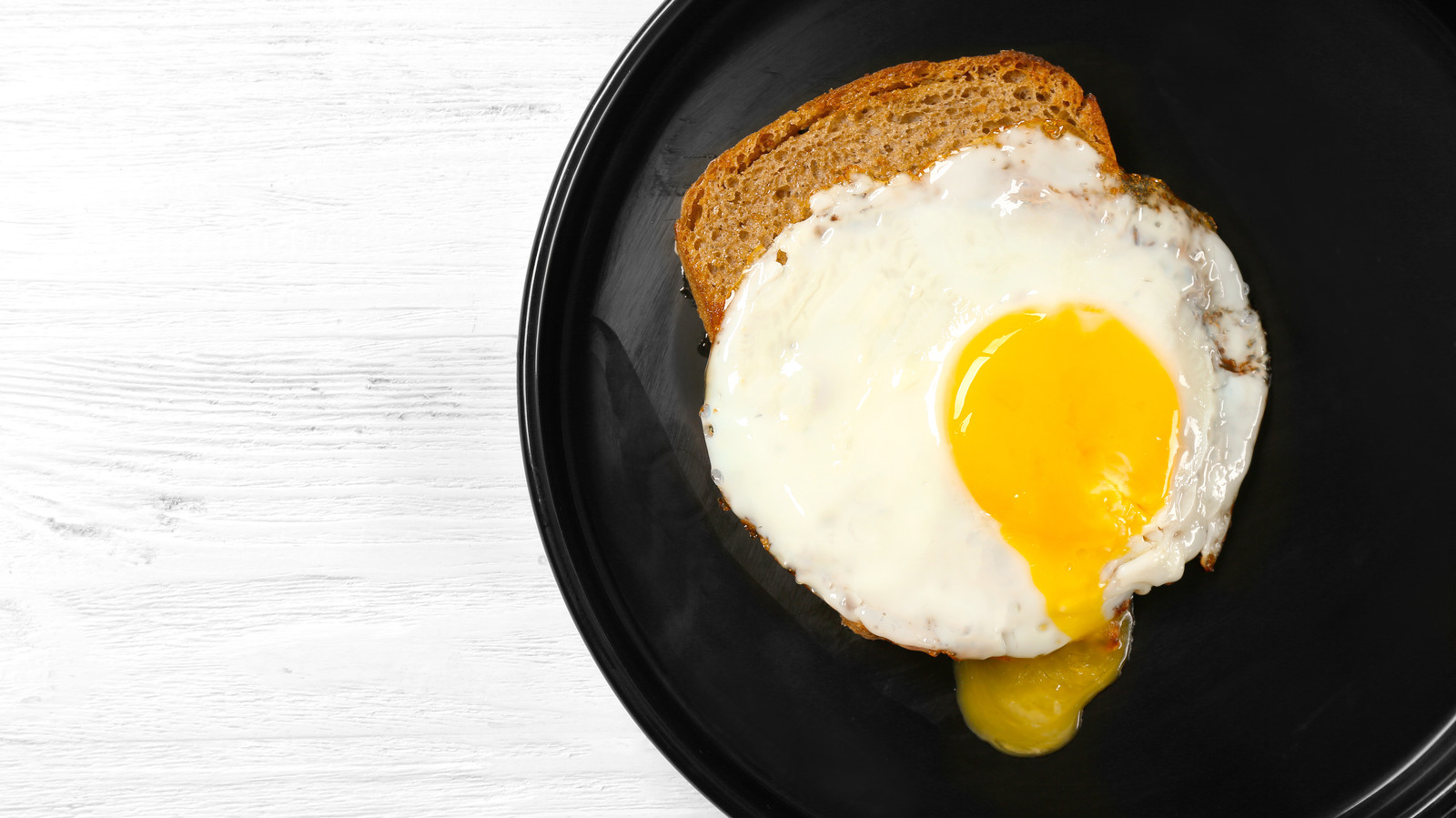 The Trick To Making Over Easy Eggs In The Microwave