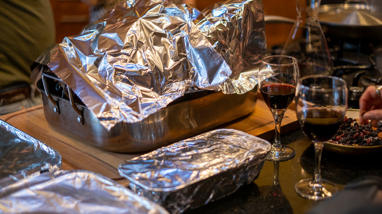 Foil-covered Thanksgiving leftovers