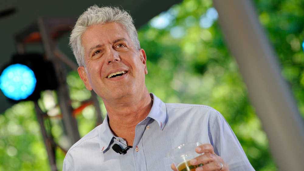 Anthony Bourdain giving toast at event