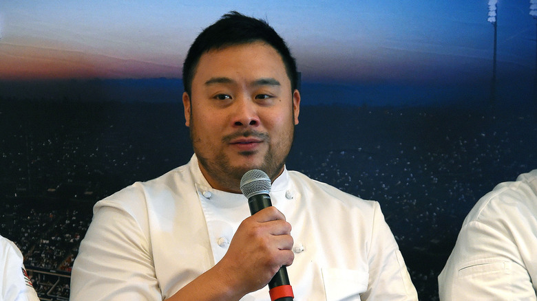 David Chang holding a microphone