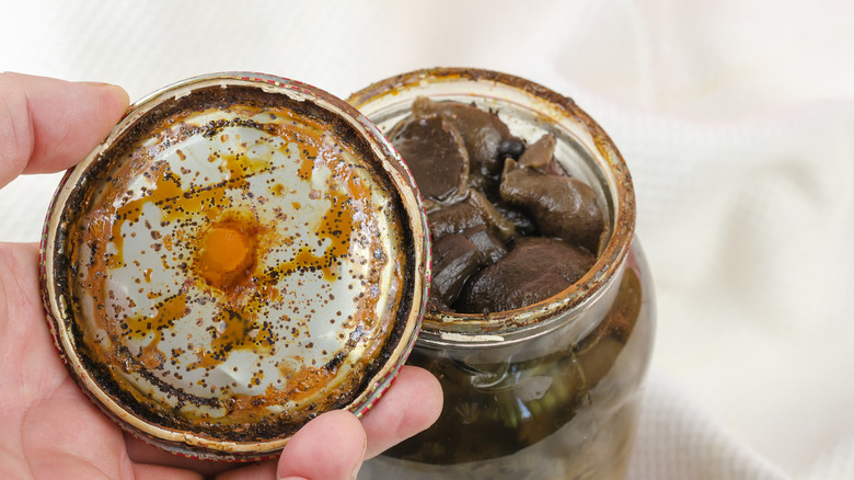 jar with rotten food