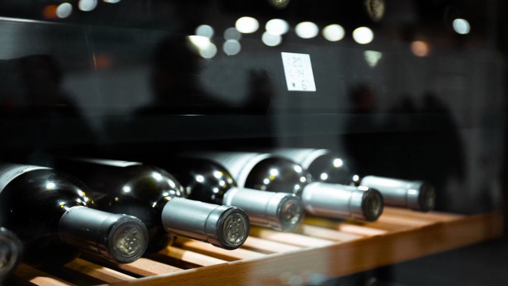 wine bottles in wine fridge 