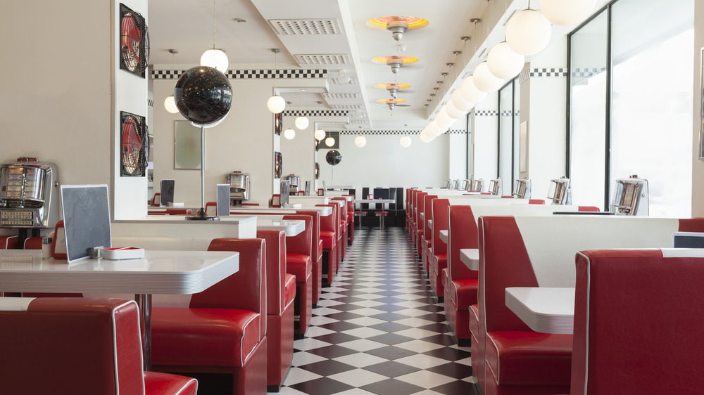 classic diner interior with red booths