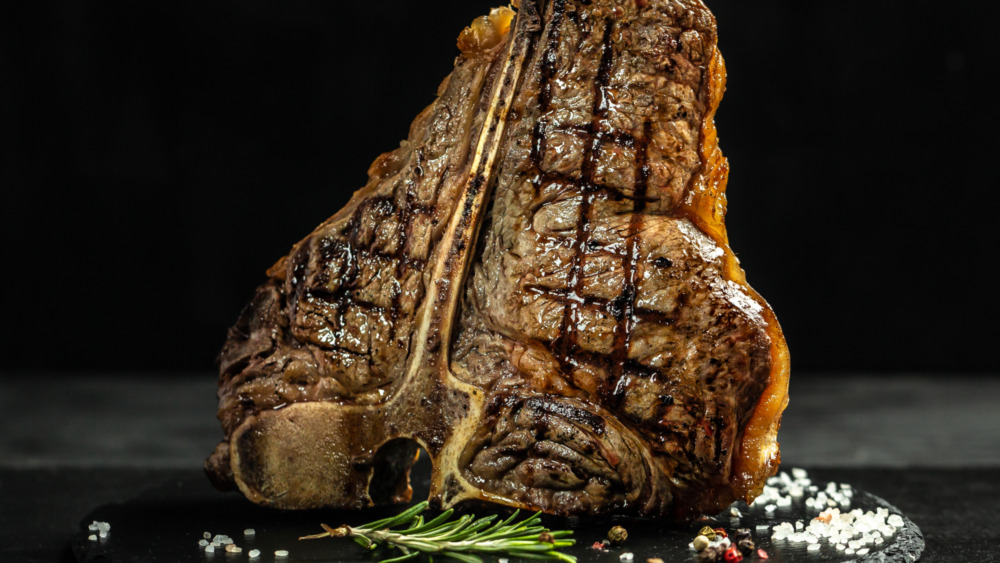 Dry aged steak plated with garnish