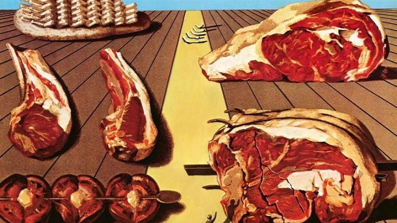 Meat on wooden boards via Les Diners de Gala