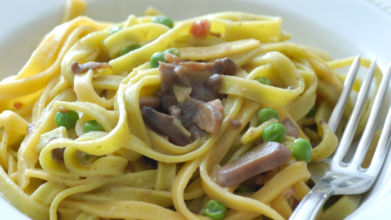 Fettuccine alla papalina with fork