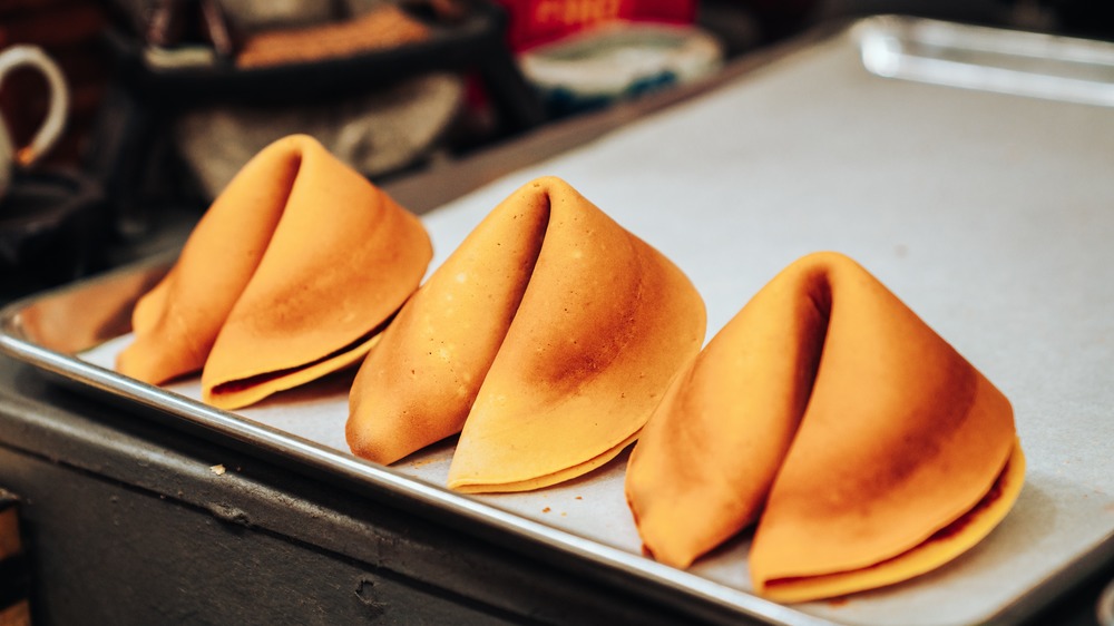 baked fortune cookies on tray