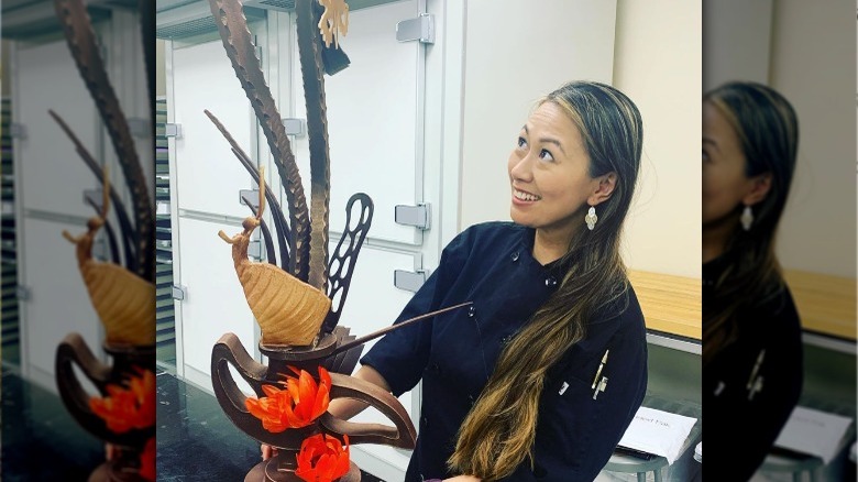 Grace Lapsys's posing with chocolate tower