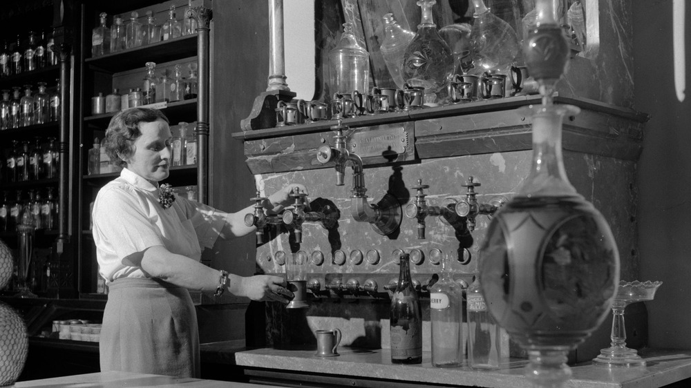 Person using soda fountain