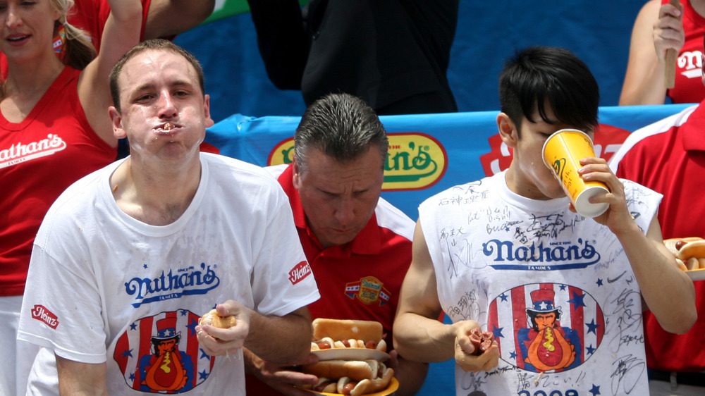 Joey Chestnut and Takeru Kobayashi in hot dog eating contest