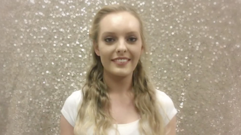 Kayla Longstreth smiling in dance video